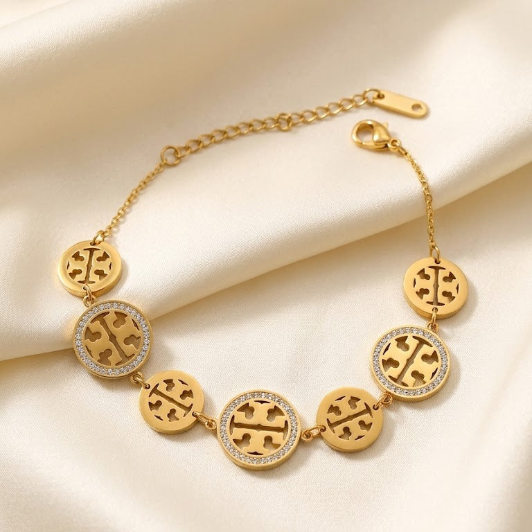 Gold bracelet with circular charms