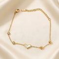 Gold bracelet with a heart charm